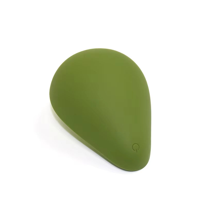 Avocado clitoral vibrator button view, compact green body-safe silicone women stimulator